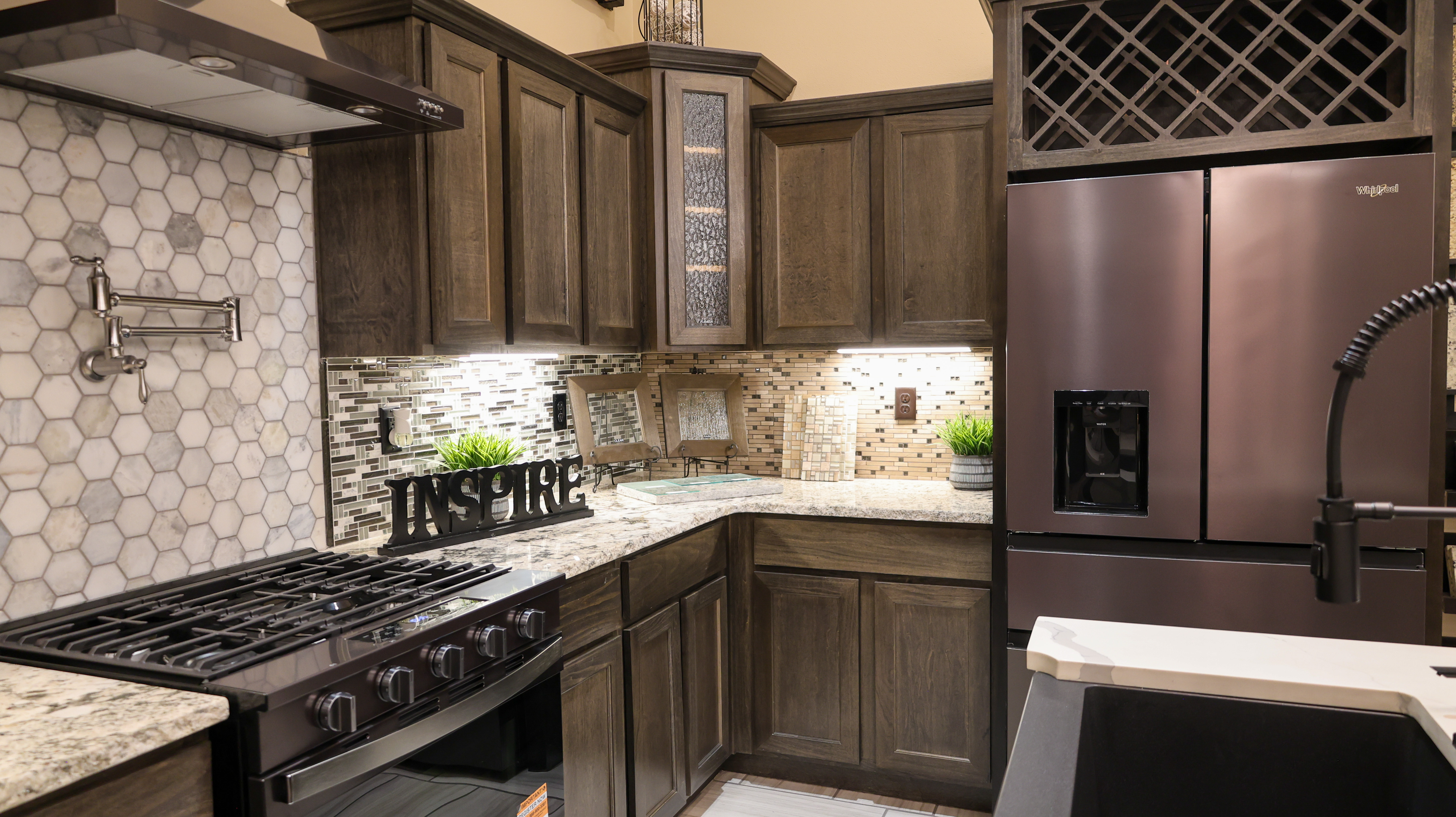 Cabinets, backsplash and appliances in the studio kitchen